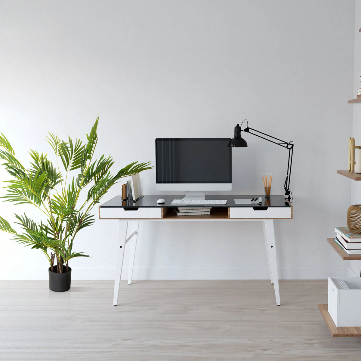 Artificial plant ARECA I in green in a simple black pot next to a desk by hjh OFFICE