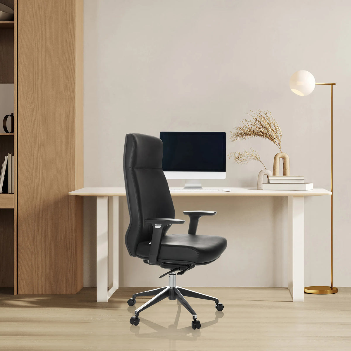 Black Professional Executive Chair VITORO ECO with armrests and castors at a desk by hjh OFFICE