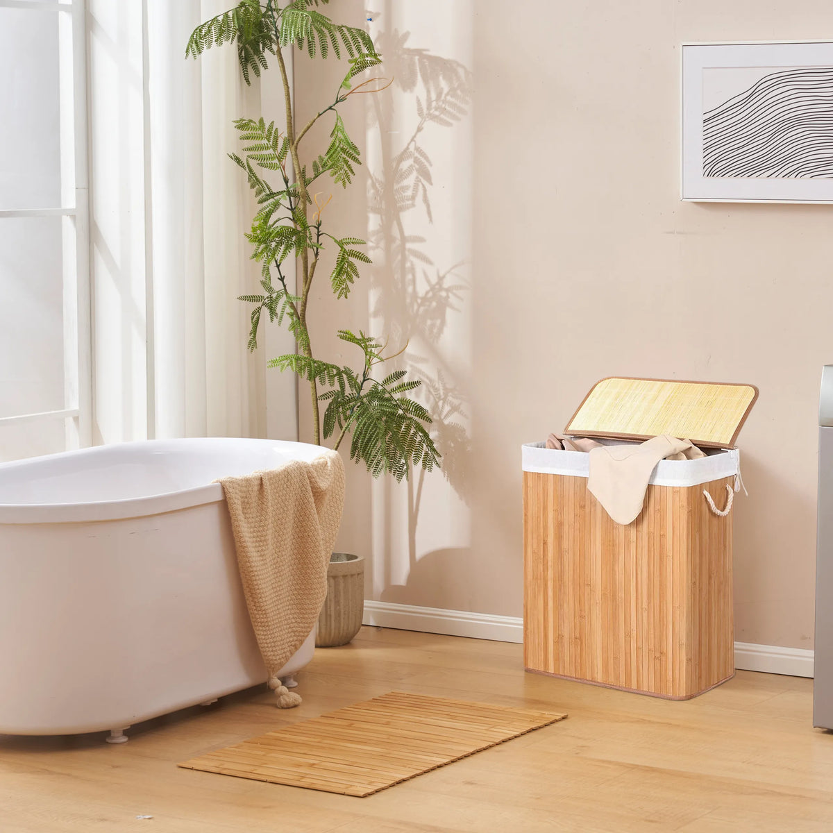 Brown bamboo FALSTER XL B laundry basket with white lining and lid in the bathroom by hjh LIVING