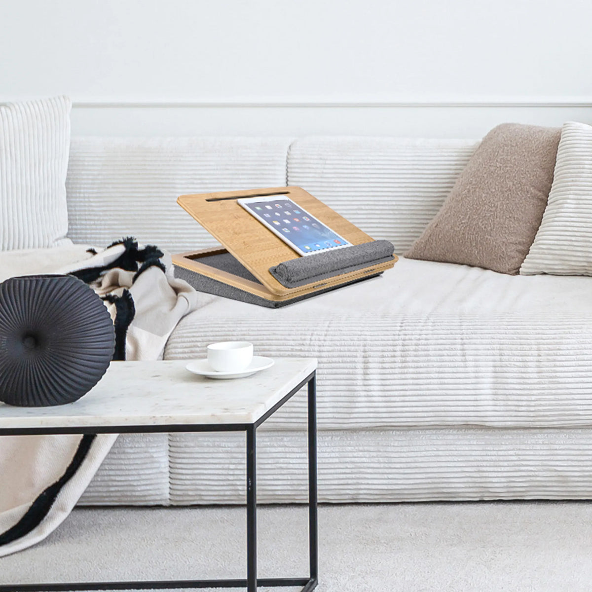 Brown COMFILAP III laptop pad with a grey cushion on a light-coloured sofa by hjh OFFICE