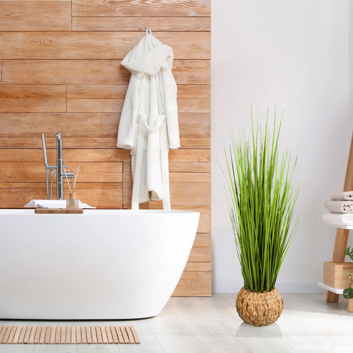 Green artificial plant CORTADERIA in a woven basket as decoration by hjh OFFICE