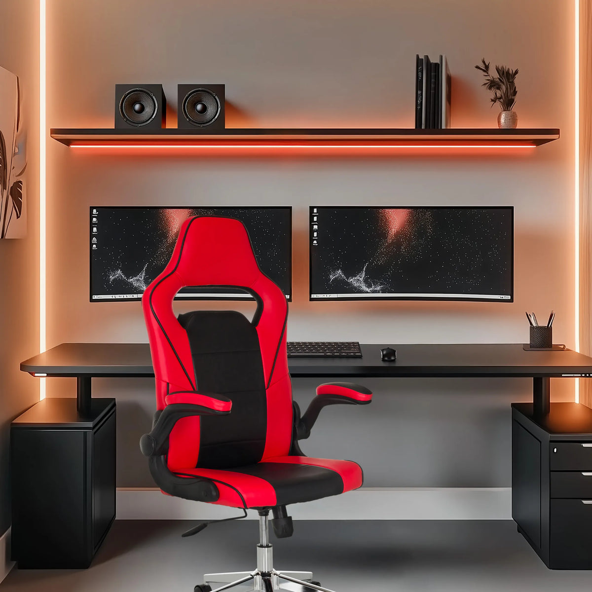 Gaming chair GAME SPORT PRO in black and red at a desk with two monitors by MyBuero