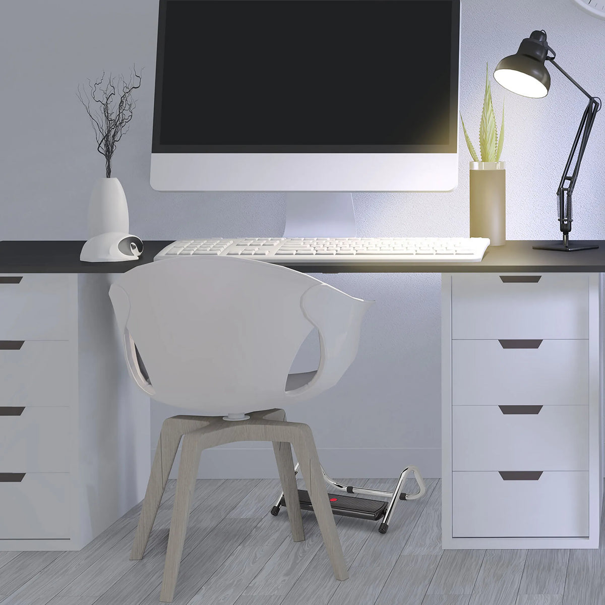 Black PODI IV footrest under a desk in a home office by hjh OFFICE