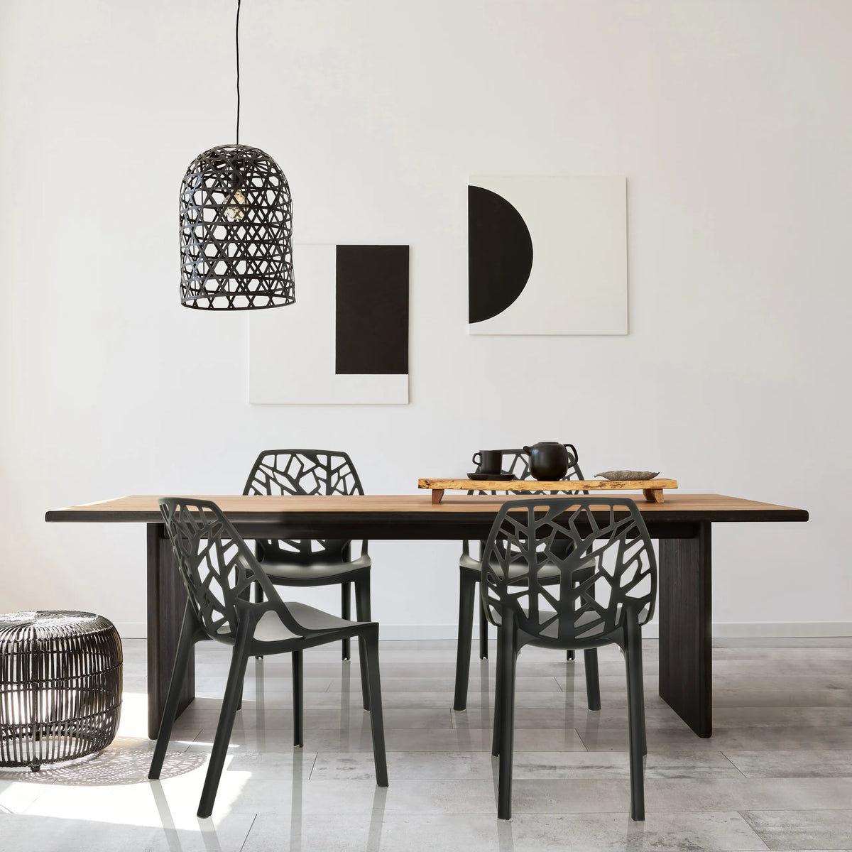 Outdoor chair ARTIFO TRI in black with mesh backrest at a wooden table by hjh OFFICE