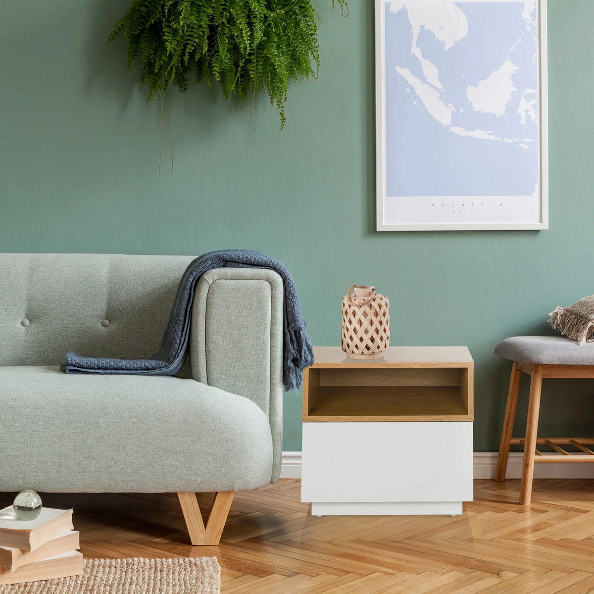 Side table MELMO in white and oak with an open shelf next to a sofa by hjh LIVING