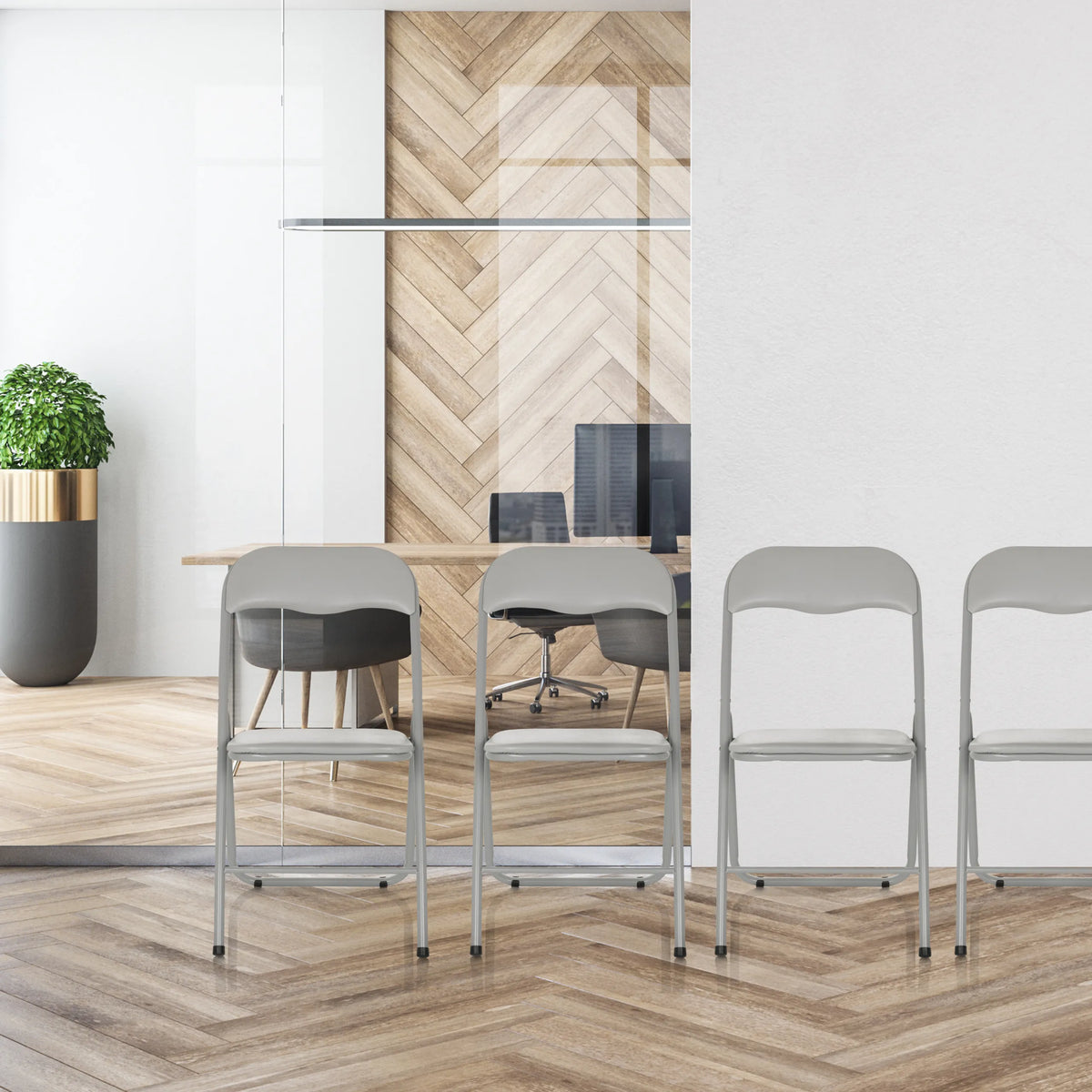 Grey TUDELA BASIC folding chairs made of PVC in a modern office environment by hjh OFFICE