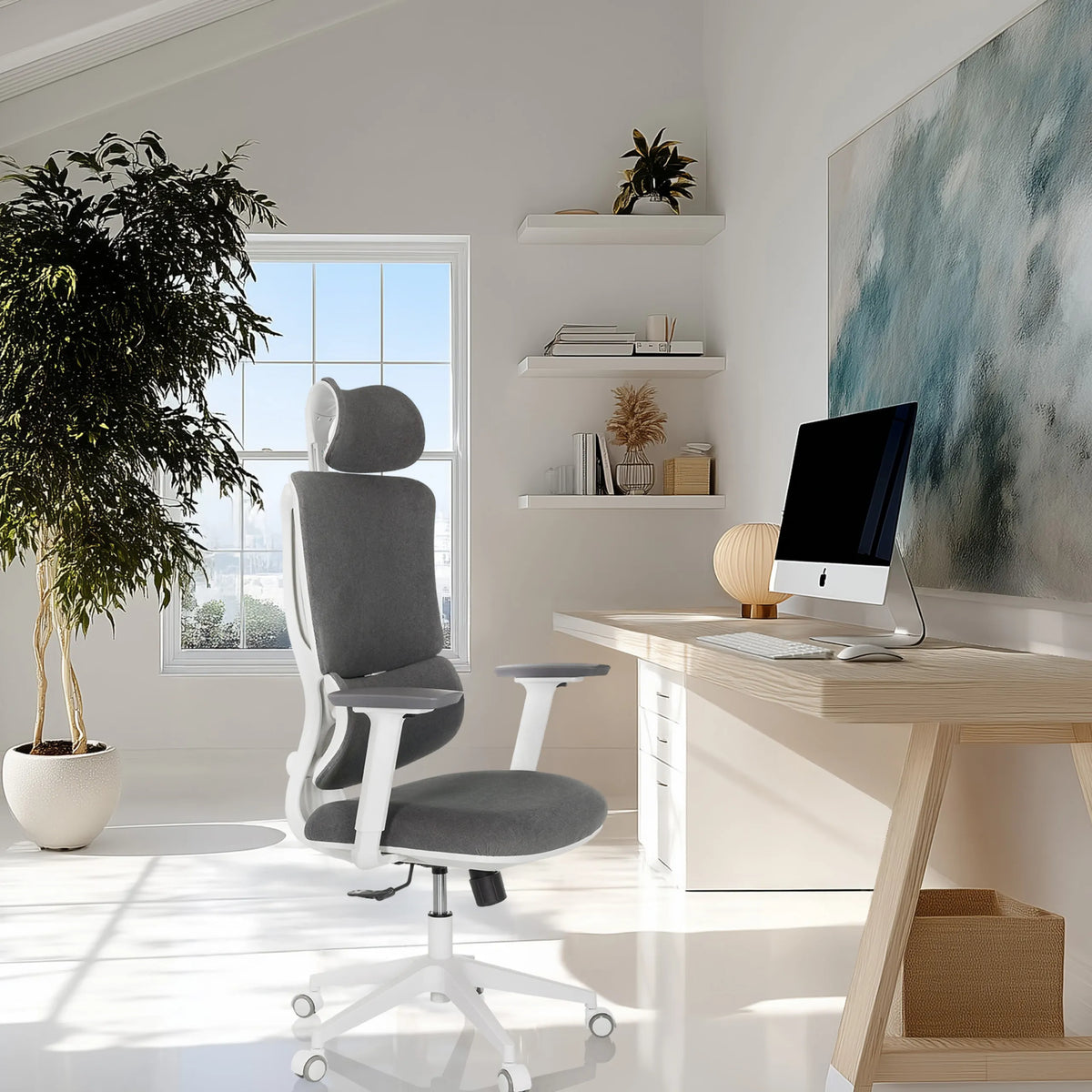 Home Office Chair ERGOMY WF with grey fabric upholstery and white frame in a bright home office by MyBuero