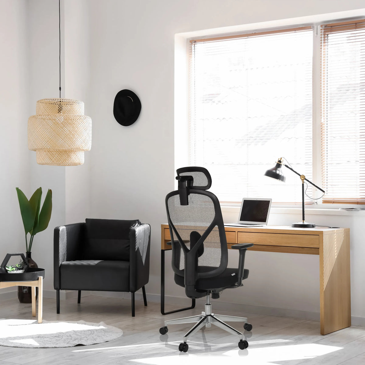Professional Office Chair RALOO PRO in black with mesh backrest and headrest at a desk by hjh OFFICE