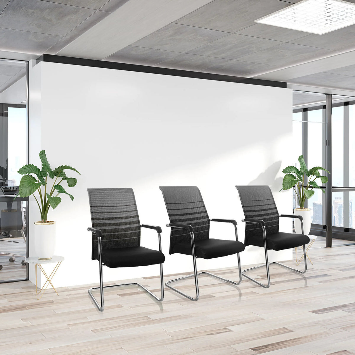 Three FALCONE V cantilever chairs in black and grey with armrests in a bright office by hjh OFFICE