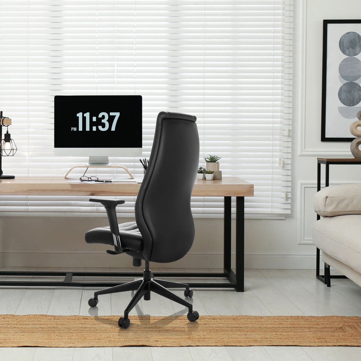 Black Professional Executive Chair VITORO B in a home office environment at a desk by hjh OFFICE