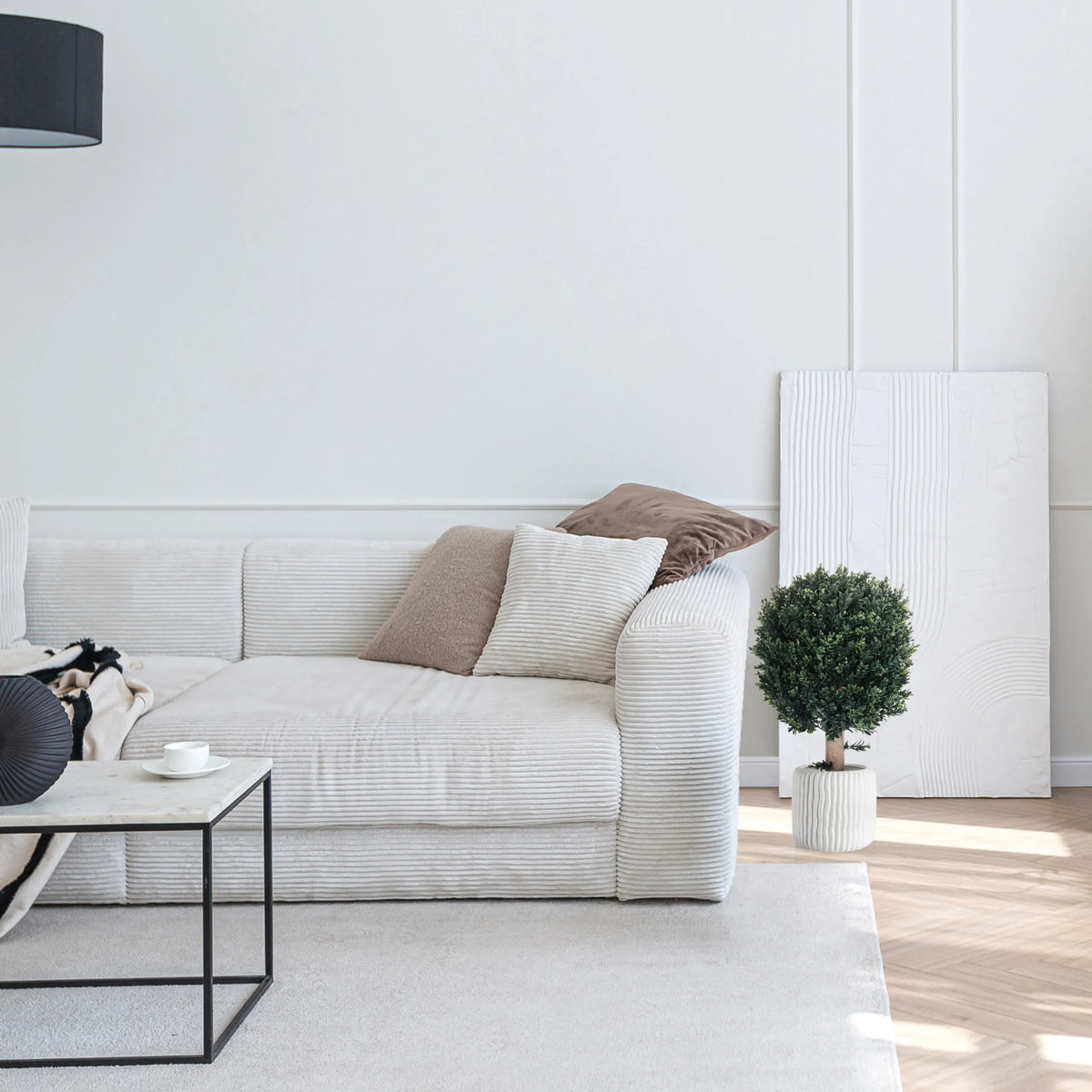 Green Artificial plant BUXUS in a white pot next to a sofa by hjh OFFICE