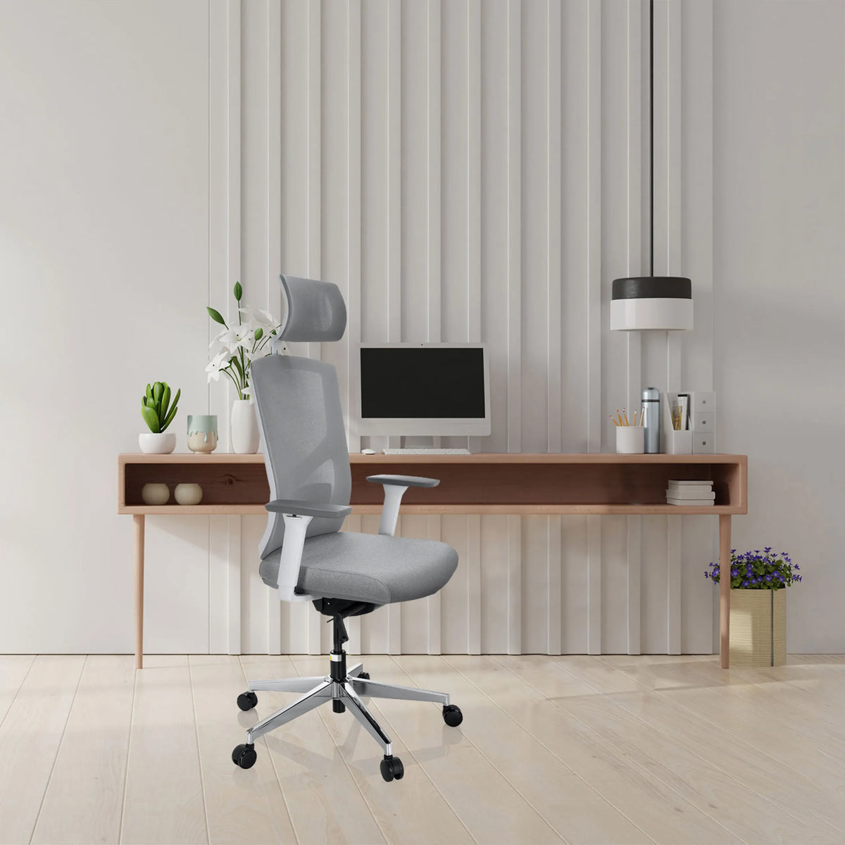 Grey Professional Office Chair BRETON PRO W with headrest and armrests in front of a minimalist desk by hjh OFFICE