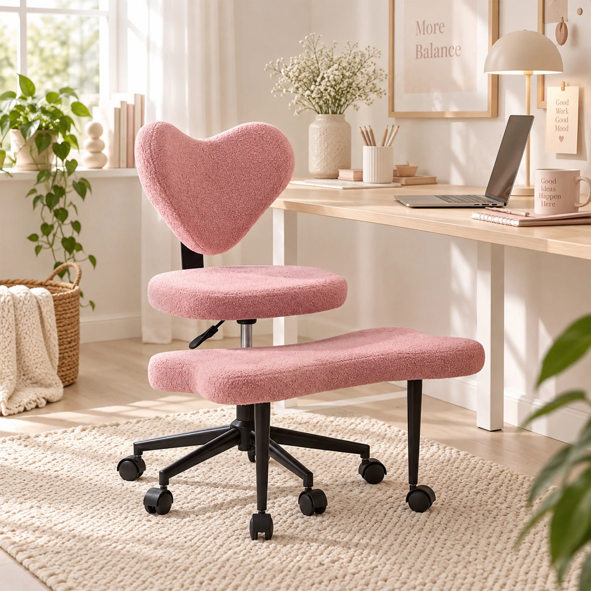 Pink Asanasit meditation chair with heart-shaped backrest and footrest in front of a desk by hjh LIVING