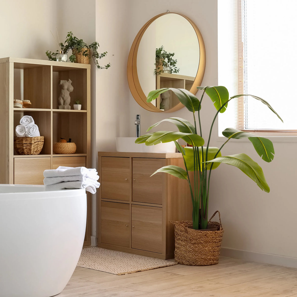 Green Artificial plant BANANE in a woven basket in the bathroom by hjh OFFICE