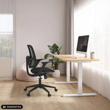 Home Office Chair Malio in black at a height-adjustable desk by hjh OFFICE (AI-generated image)
