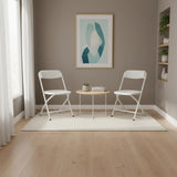 Two white TUDELA XXL PRO W outdoor chairs with a round side table in a modernly furnished room by hjh OFFICE