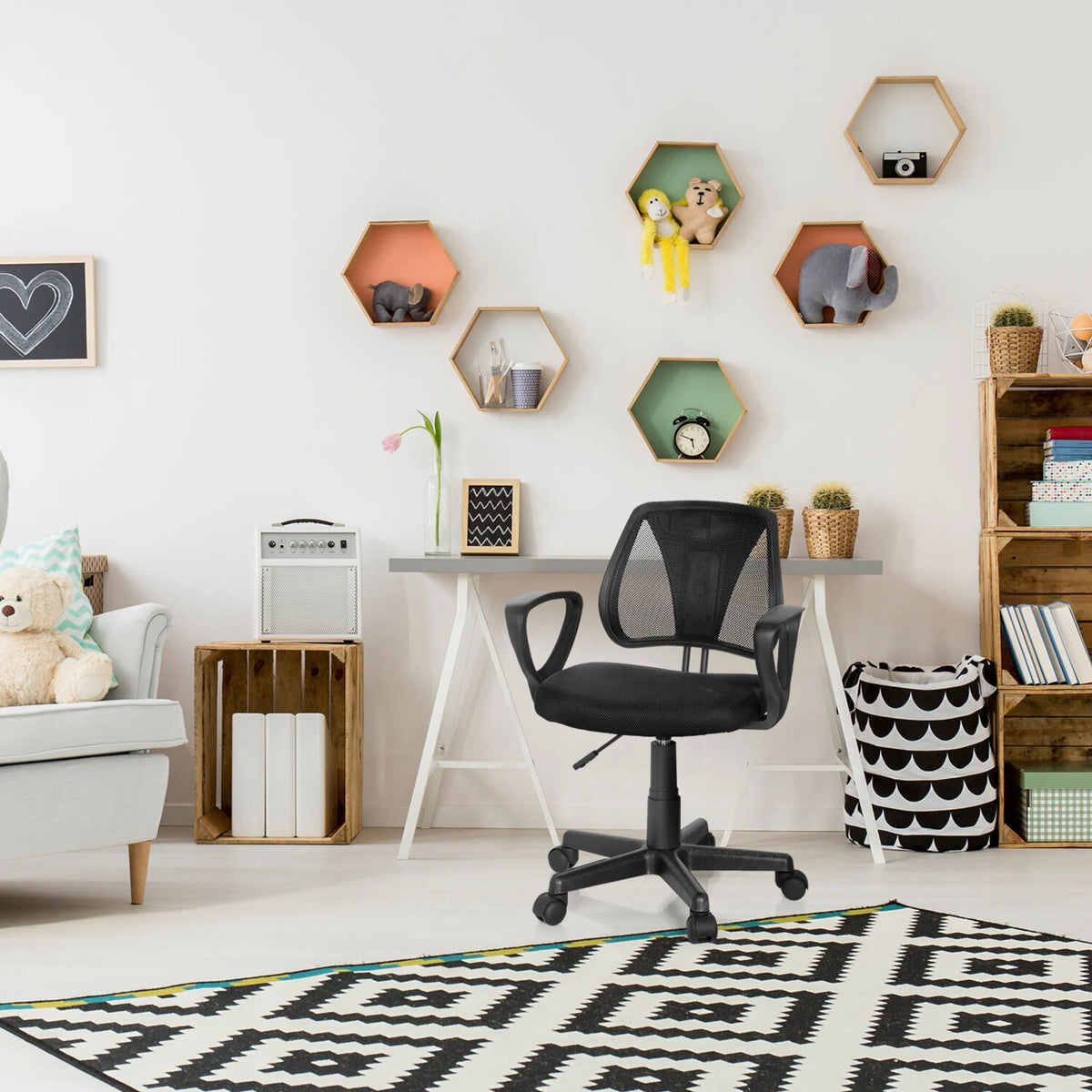 Black KIDDY CD swivel chair for children with mesh backrest and armrests in a children's room by hjh OFFICE