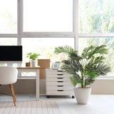 Green artificial plant ARECA II in a white pot next to a white mobile pedestal by hjh OFFICE