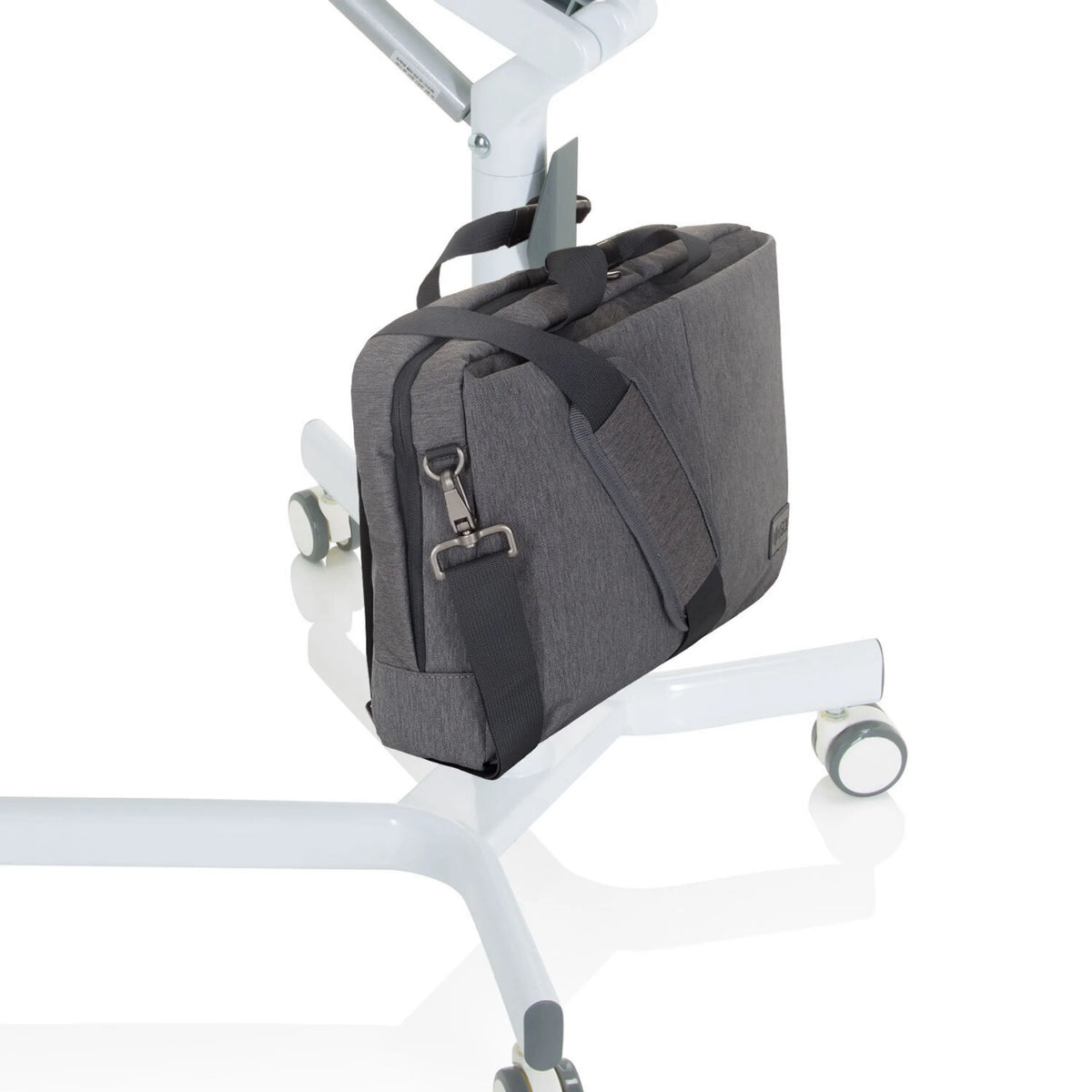 Grey laptop bag with shoulder strap on the frame of the standing desk STAND VM-SU I by hjh OFFICE