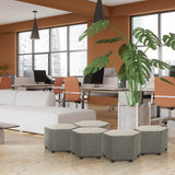 Five grey hexagonal upholstered stools BAREO in a modern office environment by hjh OFFICE