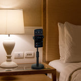 Black Mobile phone & tablet holder FLEXMOBI II with a smartphone on a bedside table by hjh OFFICE