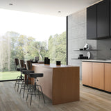 Three black DISC HIGH bar stools with metal frames at a kitchen island by hjh OFFICE