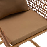 Brown seat and backrest of the Tavaro Korvik upholstered chair with a woven frame by hjh LIVING