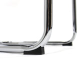 Black floor glider on the chrome frame of the Cantilever chair BRETON V W by hjh OFFICE