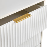 Gold-coloured handle on a white ribbed front of the Hjelle K chest of drawers by hjh LIVING
