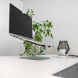 Silver LAPTOP STAND laptop pad with height-adjustable stand and laptop on a white desk by hjh OFFICE