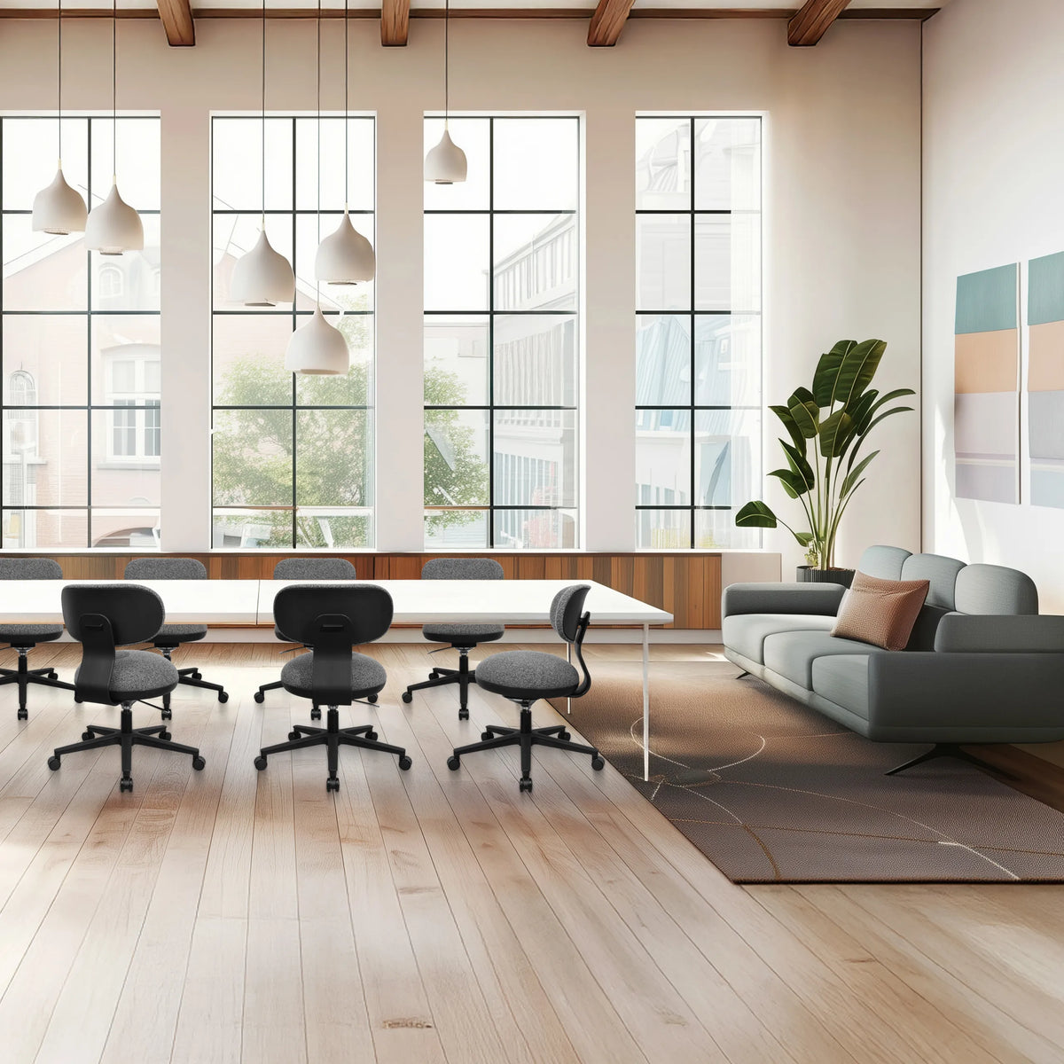 Grey Home Office Chair SITMOTION B with castors and armrests in a bright office by hjh OFFICE