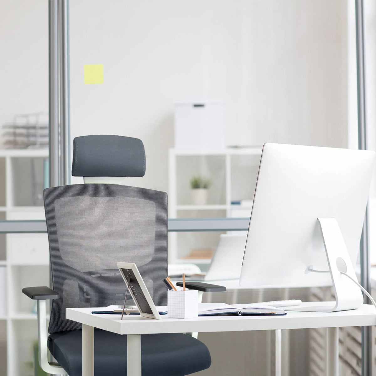 Grey Professional Office Chair CAPTIVO BASE W with mesh backrest and headrest at a desk by hjh OFFICE