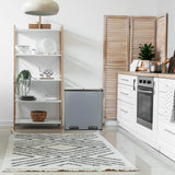 Grey wastepaper bin Clean 13 in a kitchen next to a white shelf by hjh OFFICE