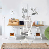 Professional Office Chair ERGOMY W in grey with a white frame and mesh backrest at a desk by MyBuero