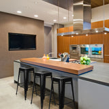 Three black VANTAGGIO HIGH bar stools at a modern kitchen island with a wooden top by hjh OFFICE