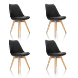 Set of four black SCANDI 4 shell chairs with light wood legs by hjh OFFICE