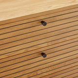 Ribbed drawer fronts with black knobs of the LINNO K Chest of drawers in oak by hjh LIVING