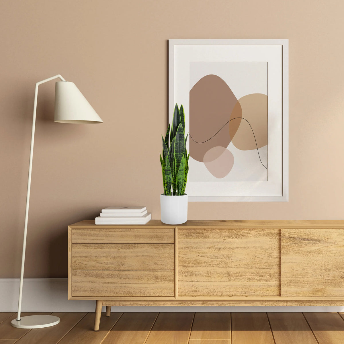 Green artificial plant SANSEVIERIA in a white pot on a wooden sideboard by hjh OFFICE