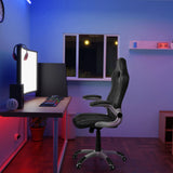 Black GAME SPORT gaming chair with armrests at a desk in a lit room by hjh OFFICE