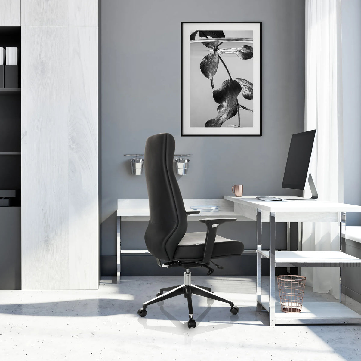 Professional Executive Chair VITORO ECO in black with a high backrest and star base in front of a white desk by hjh OFFICE