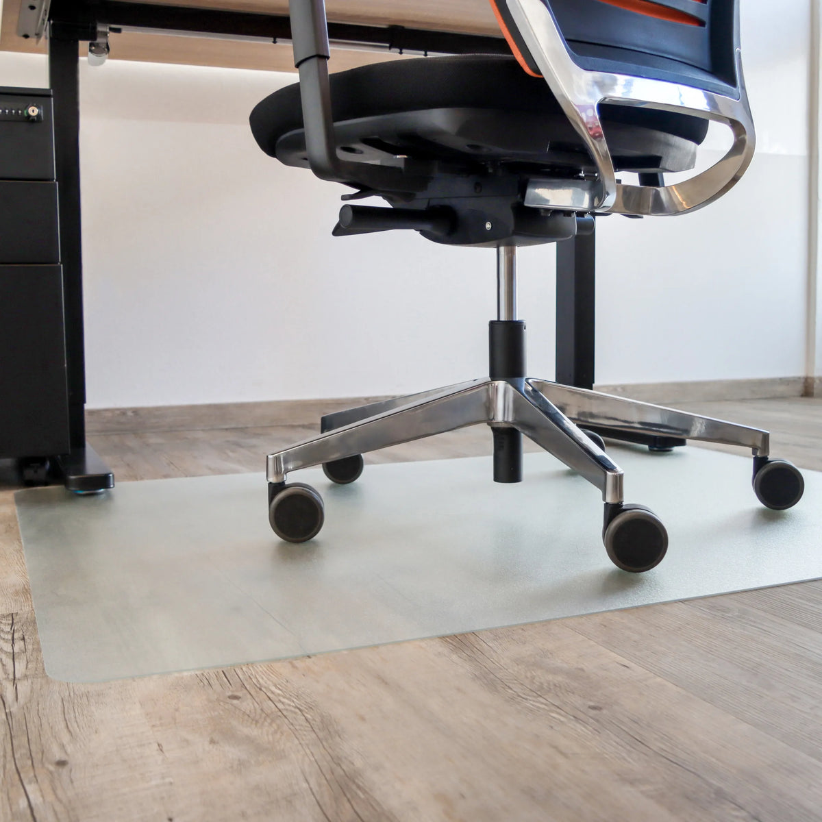Transparent PUNOMAT Office Mat for hard floors under an office chair by Kottig