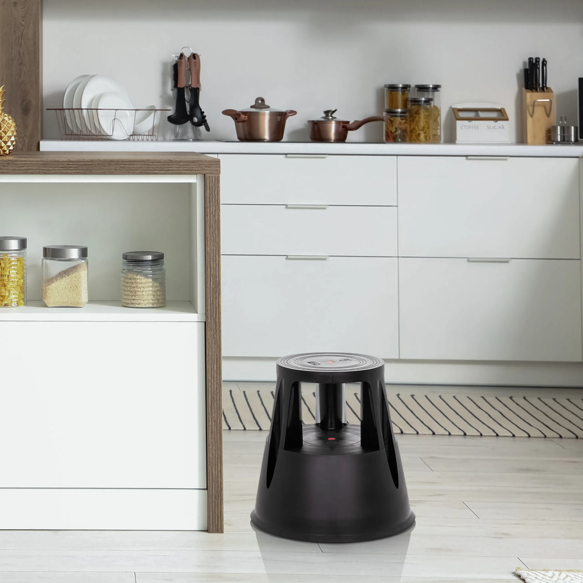 Black step stool TIO-M I with round base in a kitchen by hjh OFFICE