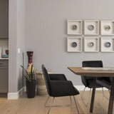 Black upholstered chair DESIGNIA V with slim metal legs at a wooden table by hjh OFFICE