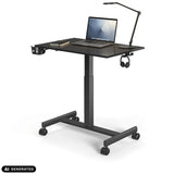 Black Stand K standing desk on castors with laptop and desk lamp by hjh OFFICE (AI-generated image)