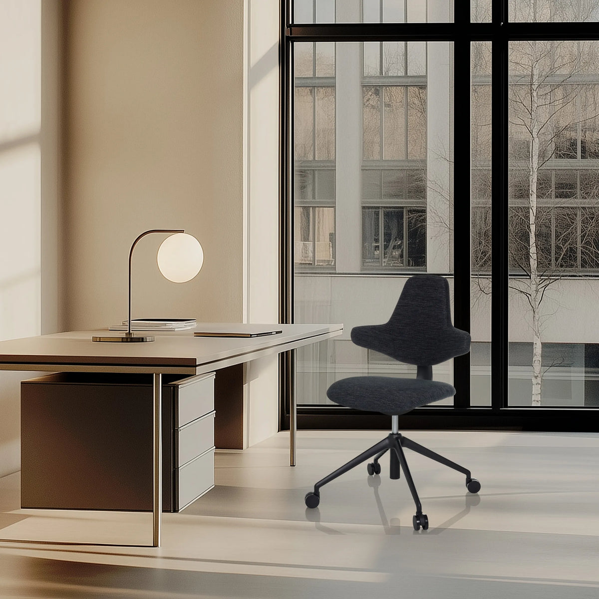 Black Professional Office Chair PALIANO with five castors in front of a desk by hjh OFFICE