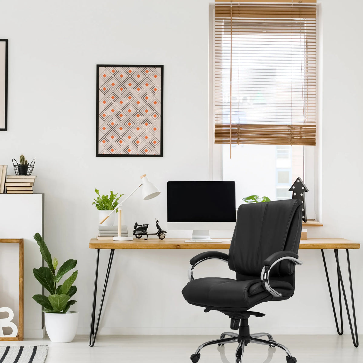 Black Swivel Chair XXL H 100 made of faux leather at a desk by hjh OFFICE