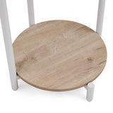 Round oak-effect tabletop of the Nestup 1 side table with white legs by hjh LIVING