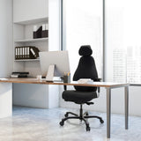 Black Professional Executive Chair RESISTIO XXL with headrest and armrests at a desk by hjh OFFICE