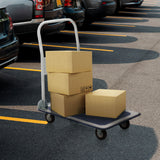 Blue and white platform trolley CARRY with three loaded cardboard boxes in a car park by hjh OFFICE