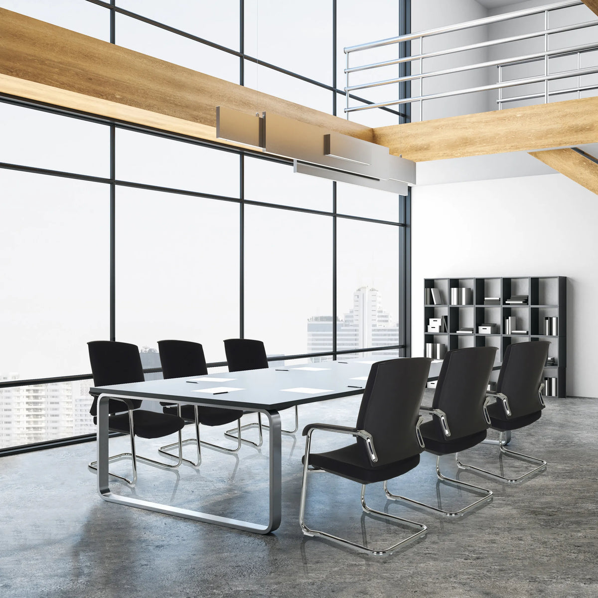 Black LEVIA VP cantilever chairs with armrests at a conference table in a bright office by hjh OFFICE